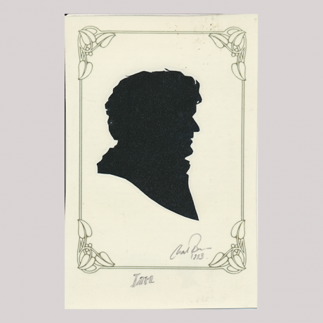 
        Front of silhouette, with man in frame looking right.